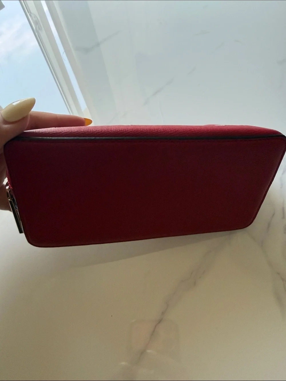 kate spade Red and Cream Cruella Cosmetic Pouch with Gold Logo